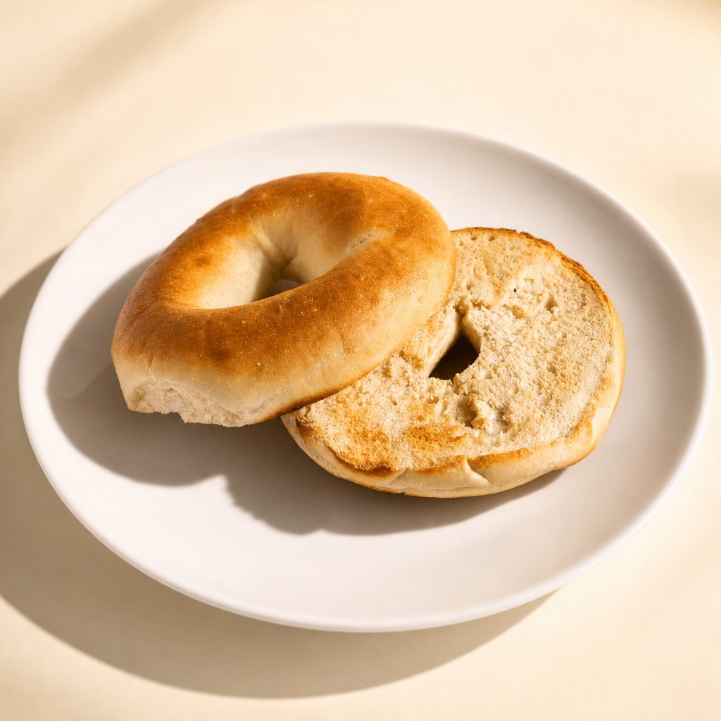 Bagel with Butter, Honey-Butter, Honey, or Jelly.